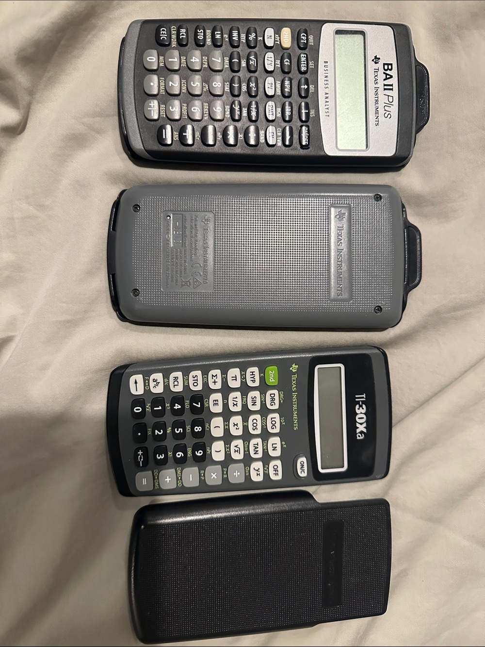 Texas Instruments Scientific Calculators in Gray and Black with Green Accent
